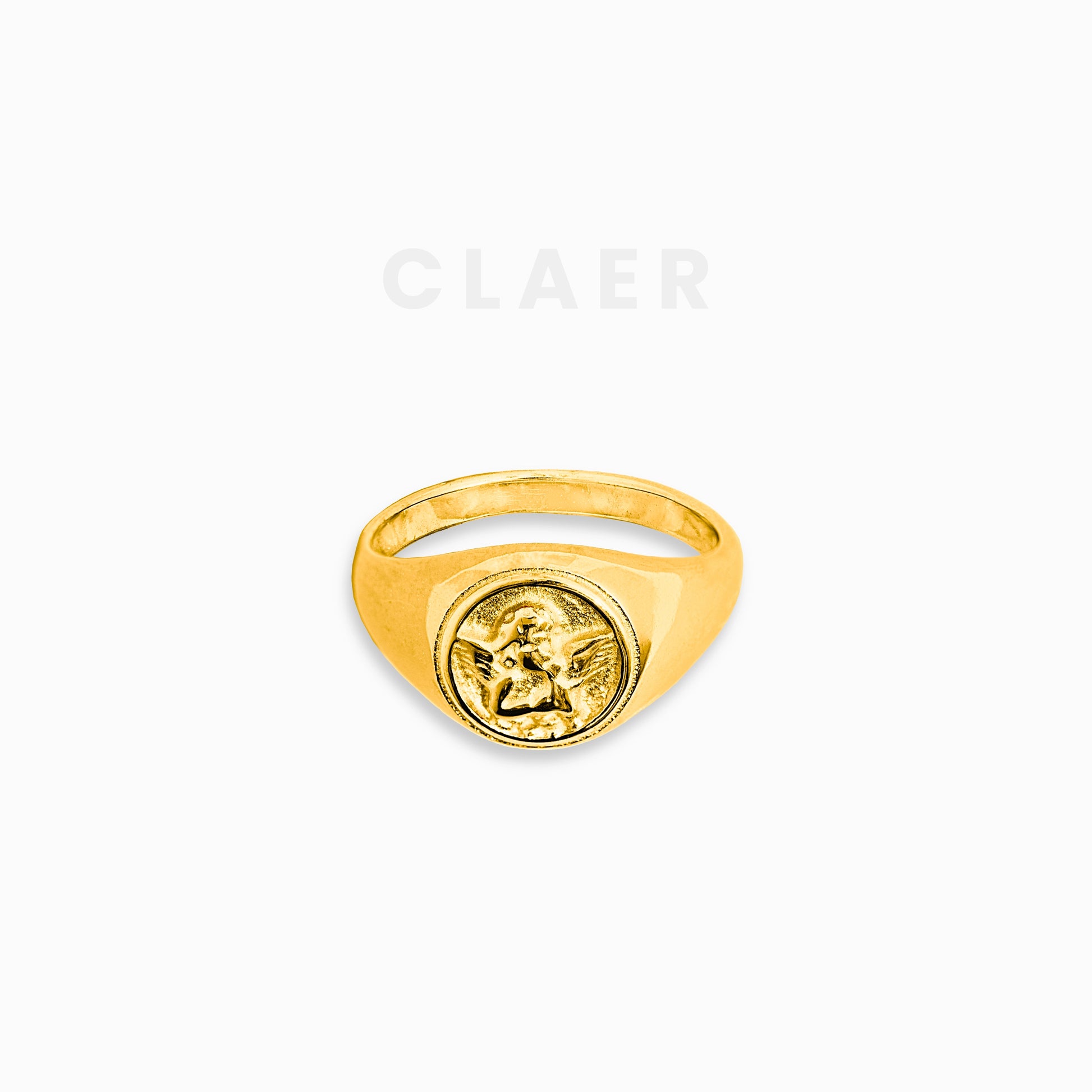 Goldener Ring mit filigranem, eingraviertem Schutzengel-Motiv.