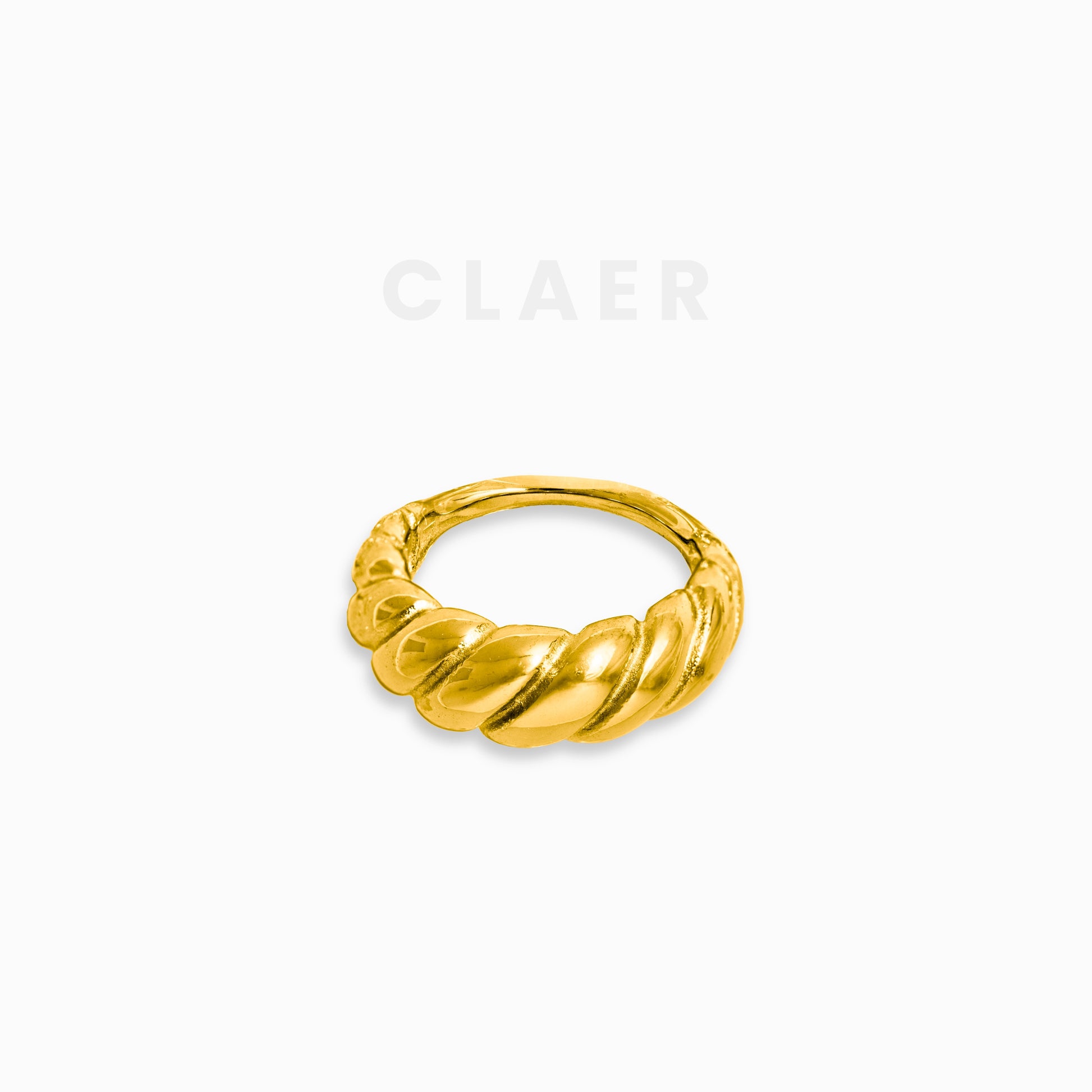Massiver, goldener Ring mit auffälligem Swirl-Design.