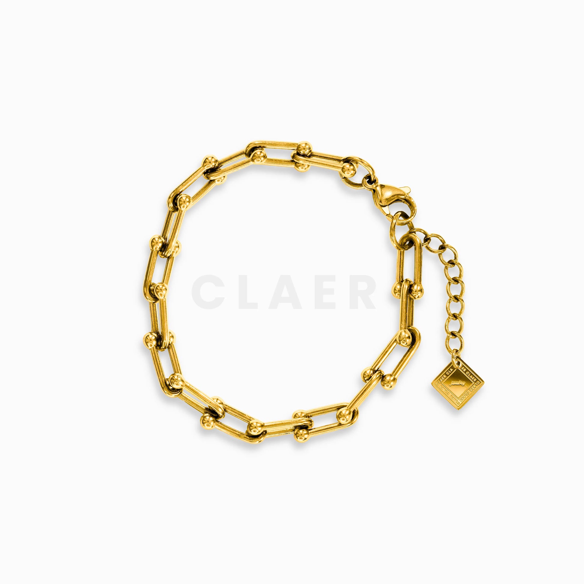 Goldenes Horseshoe-Armband im Hufeisen-Gliederdesign mit Logo-Tag von CLAER.
