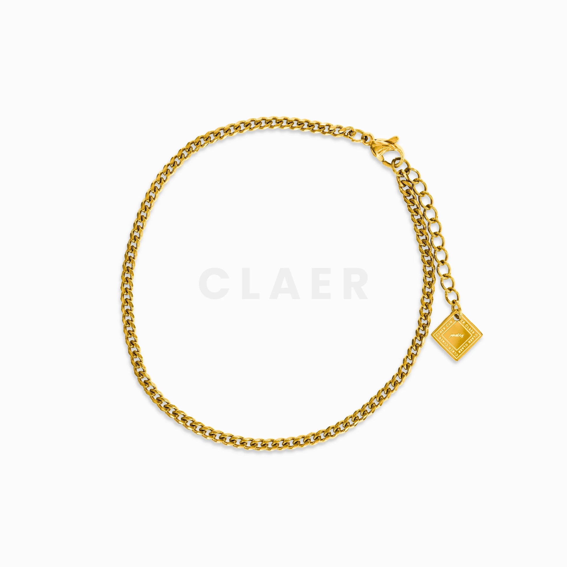 Goldenes Miami Cuban Fusskettchen mit feinem Gliederdesign und Logo-Tag von CLAER.