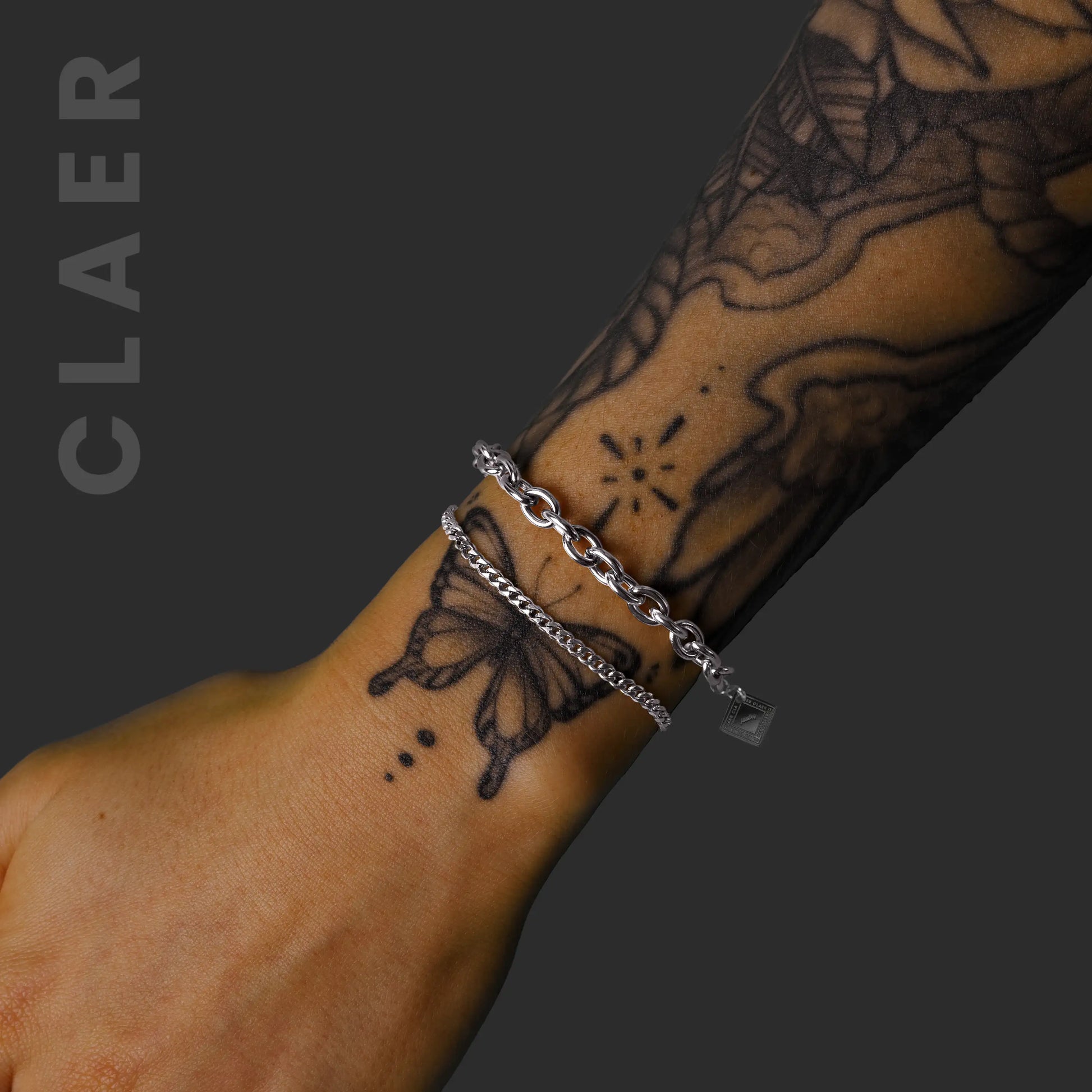 Unser silbernes Miami Cuban-Armband mit unserem Armband mit runden Gliedern, in Kombination getragen.