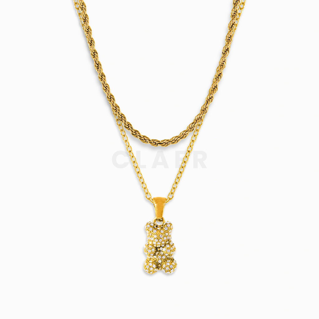 Goldene Rope-Halskette mit funkelndem Diamant-Bär-Anhänger.
